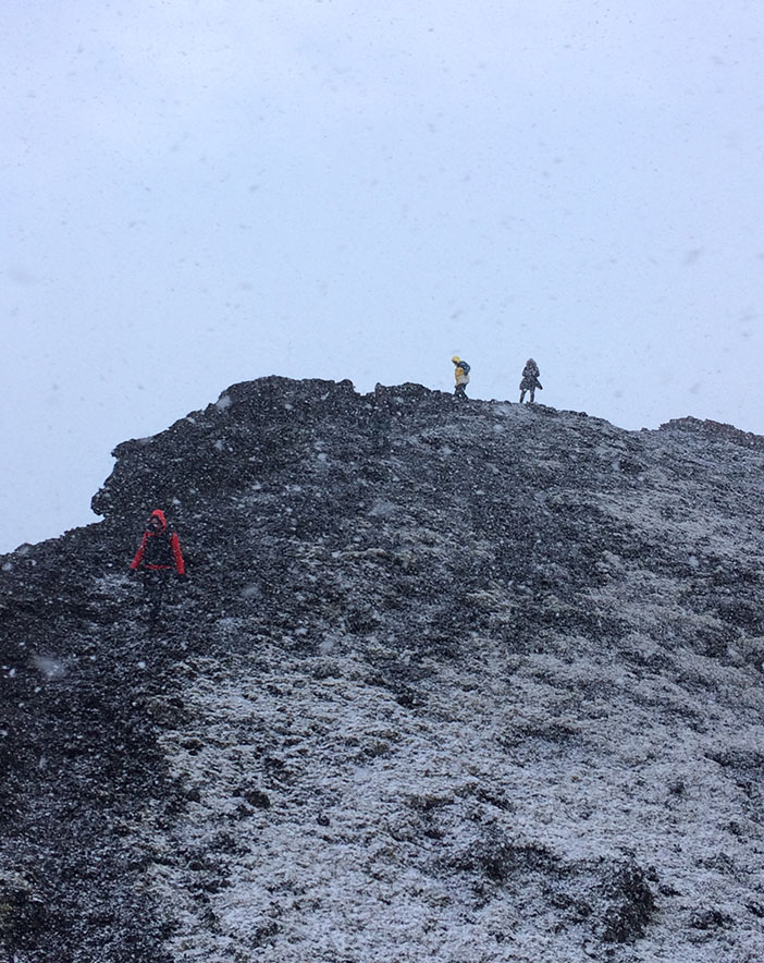 Climbing an extinct volcanic cone in a snowstorm near Reykjavik, Iceland | meljoulwan.com